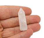 Clear Quartz obelisk tower crystal, 40mm, from GemstoneGO, showcasing a transparent, polished mineral monument with natural formations.