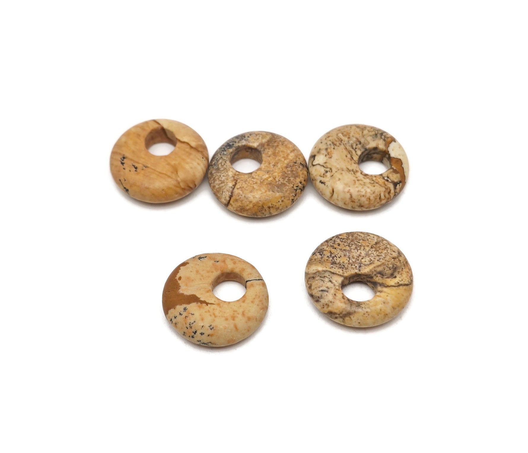 Picture Jasper crystal donut pendant from GemstoneGO, 18mm Pi Stone with natural earthy tones and polished surface.
