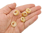 Yellow jade crystal donut from GemstoneGO, 18mm Pi stone with vibrant yellow color and smooth polished surface.