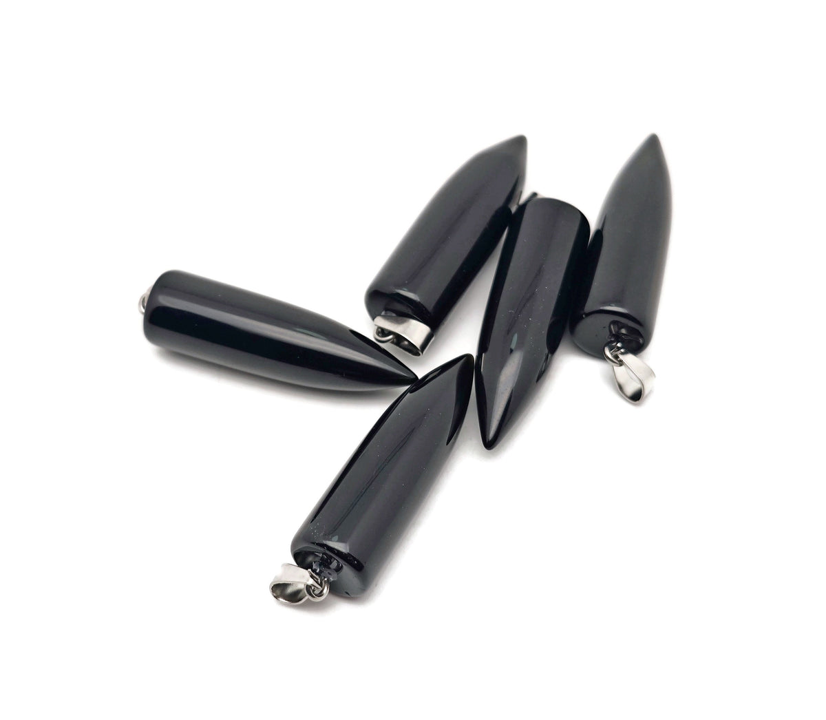 Polished obsidian bullet gemstone pendant with carved details, featuring a sleek black finish and smooth, rounded shape.
