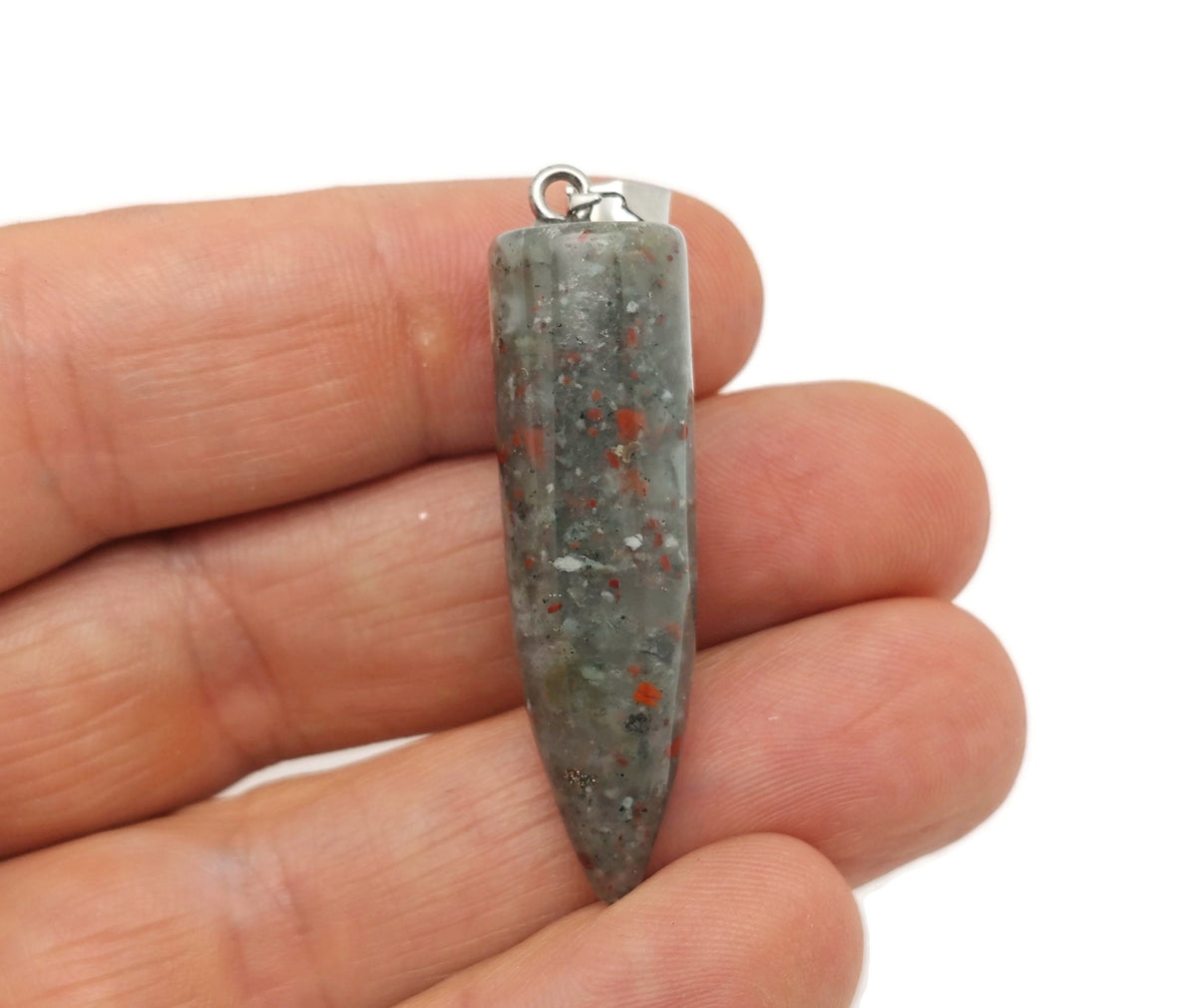 Polished African Bloodstone bullet gemstone pendant with carved details, showcasing deep green and red natural stone features.
