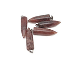 Polished strawberry quartz bullet-shaped gemstone pendant with carved details, from GemstoneGO.