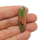 Polished unakite bullet gemstone pendant carved into a smooth, polished bullet shape by GemstoneGO.