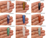 Polished bullet-shaped gemstone pendant from GemstoneGO featuring carved crystal healing mineral, in a mix of vibrant gemstone colors.