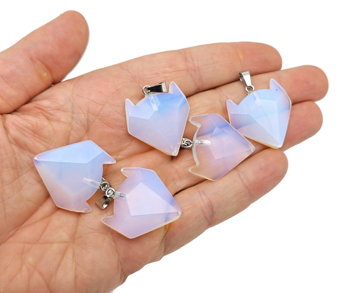 Crystal wolf head gemstone pendant from GemstoneGO, featuring detailed wolf design in sparkling crystal gemstone jewelry.