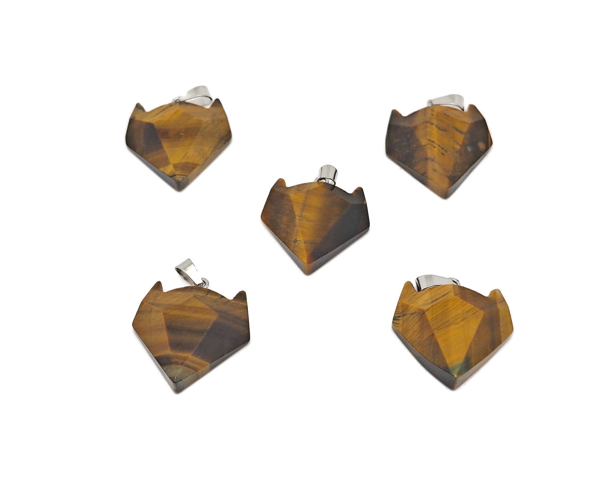 Tiger Eye wolf head gemstone pendant, crystal jewelry piece with detailed wolf design from GemstoneGO.