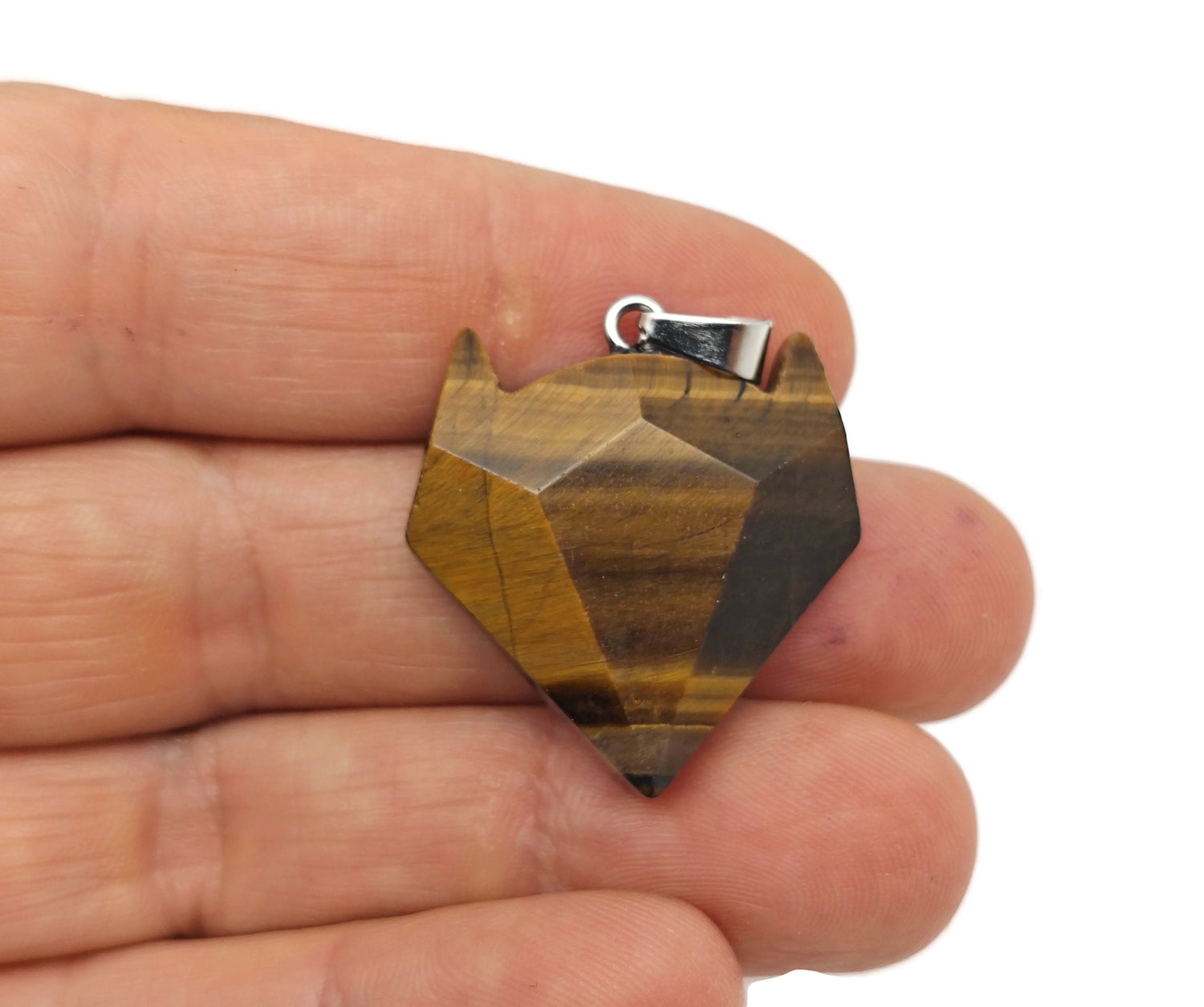 Tiger Eye wolf head gemstone pendant, featuring detailed crystal jewelry design with natural stone and intricate craftsmanship.