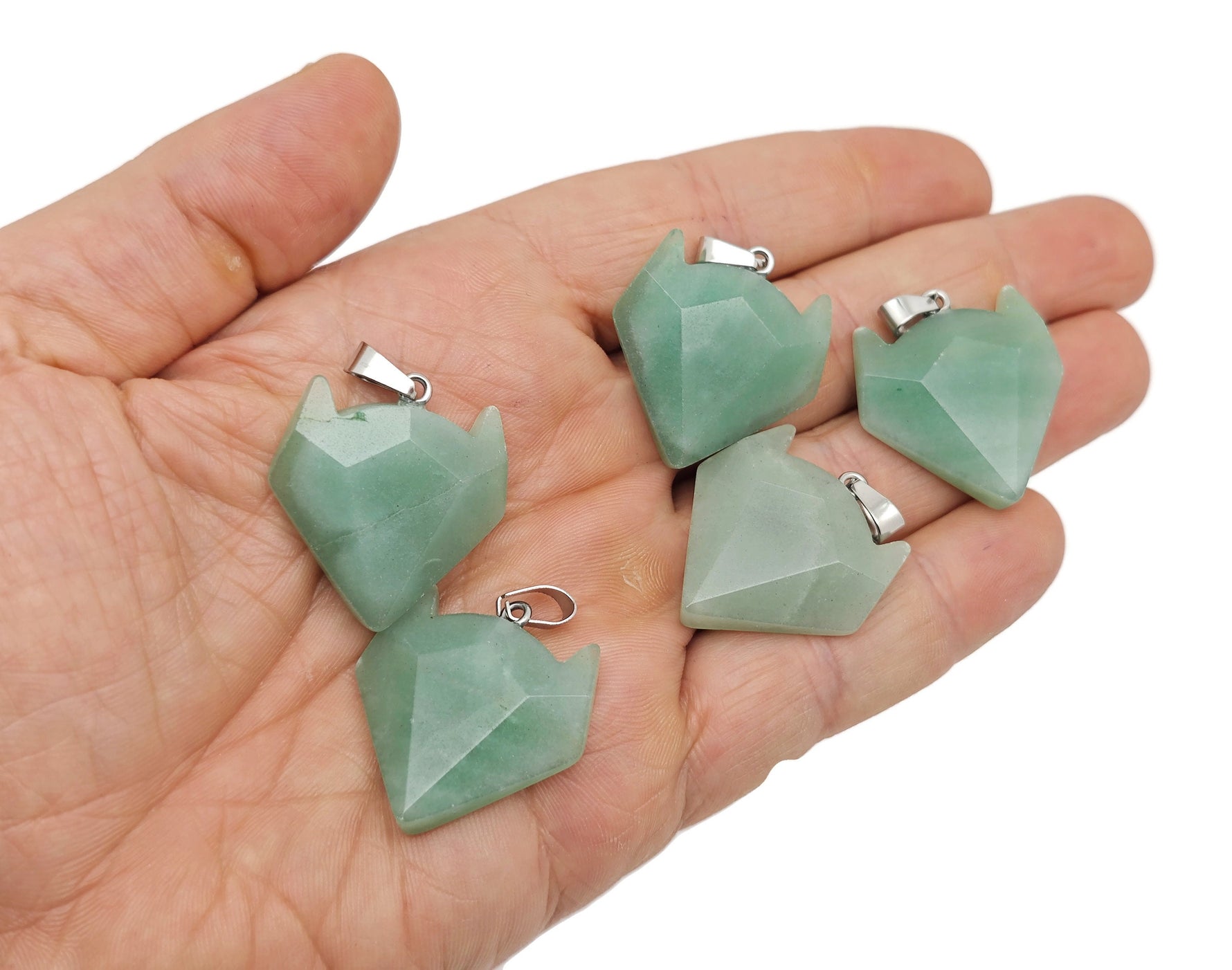 Aventurine gemstone wolf head pendant necklace by GemstoneGO, featuring a detailed wolf design carved from green aventurine crystal.