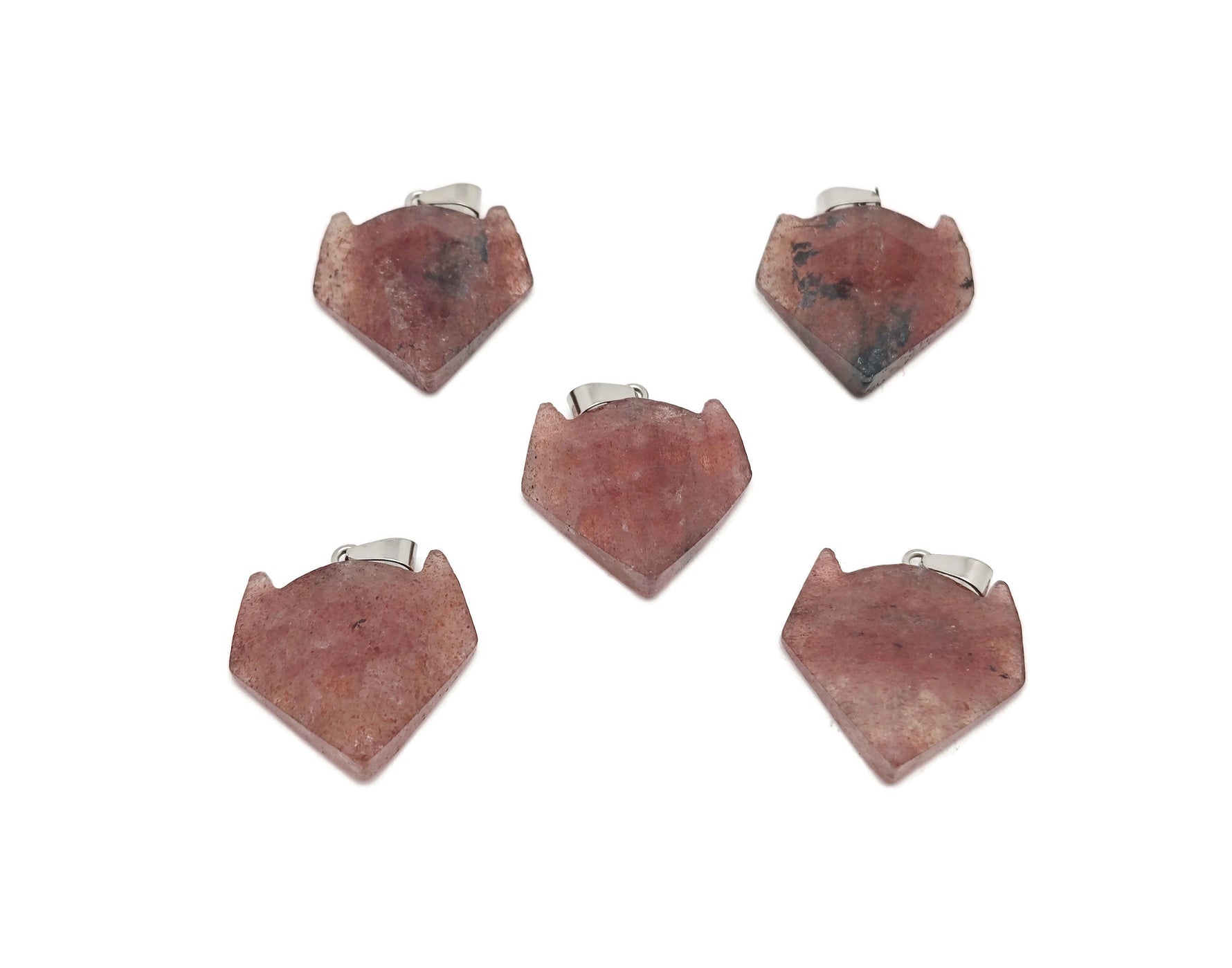 Strawberry Quartz wolf head gemstone pendant from GemstoneGO, featuring detailed crystal jewelry design on a necklace chain.