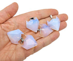 Opalite wolf head gemstone pendant from GemstoneGO, featuring a detailed wolf design with polished opalite stone for jewelry.