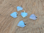 Opalite gemstone wolf head pendant from GemstoneGO, featuring a detailed wolf design and polished gemstone for crystal jewelry.