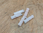 Rose quartz bamboo-shaped crystal pendant from GemstoneGO, featuring a protective healing crystal design.