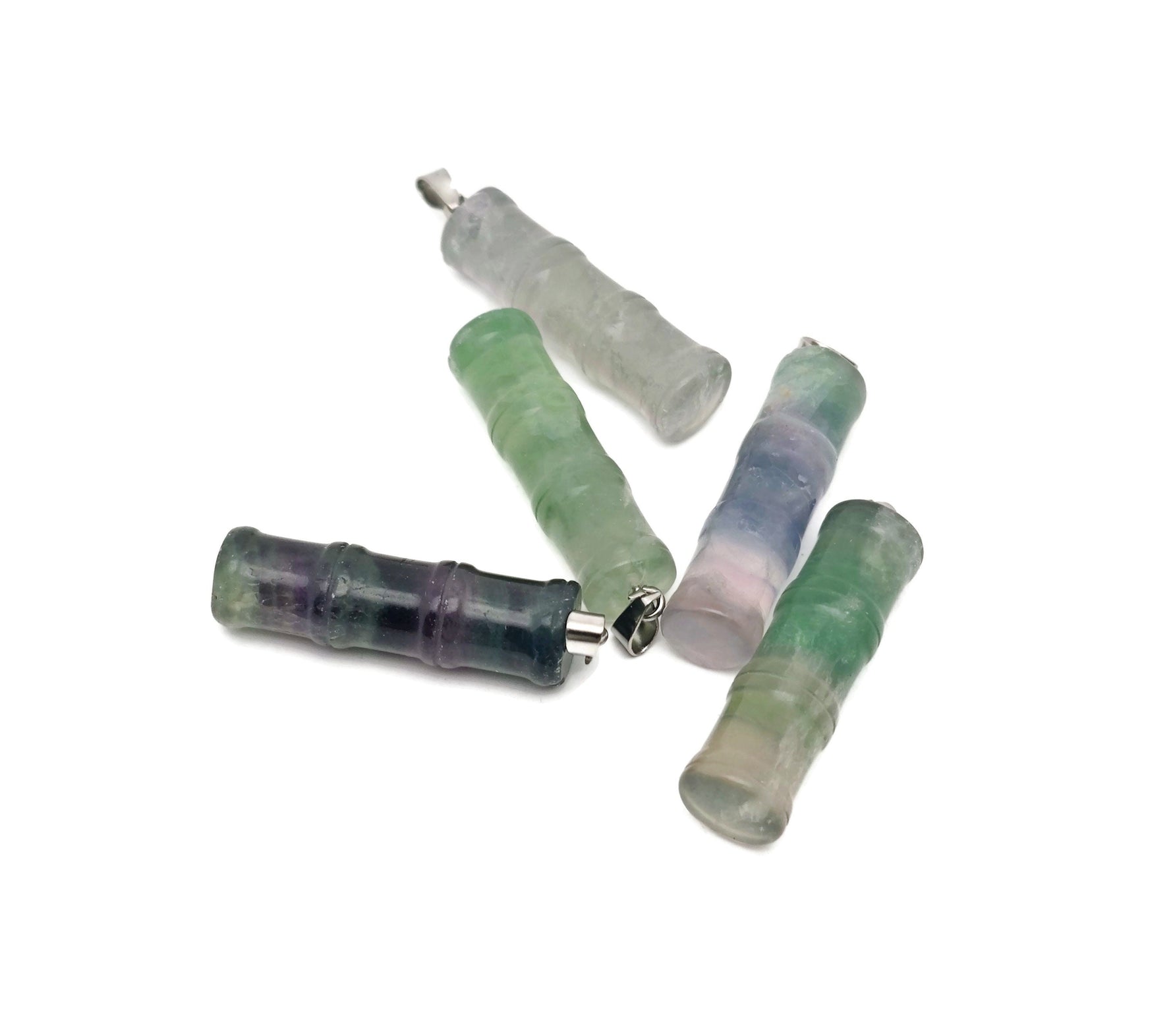 Fluorite bamboo-shaped crystal pendant by GemstoneGO, showcasing a vibrant green and purple protective gemstone jewelry piece.