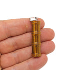 Tiger Eye bamboo-shaped crystal pendant from GemstoneGO, featuring a protective tiger eye gemstone in a bamboo design.