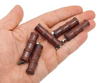 Chicken Bloodstone Jasper bamboo-shaped crystal pendant from GemstoneGO, featuring vibrant red and green bloodstone hues.