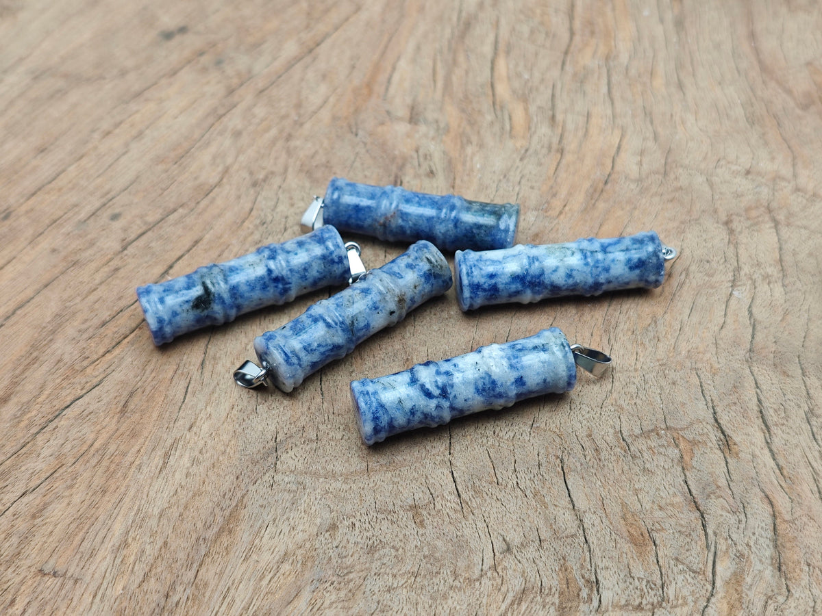 Blue Spot Jasper bamboo-shaped crystal pendant from GemstoneGO featuring a protective crystal design.