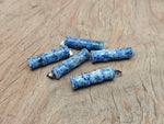 Blue Spot Jasper bamboo-shaped crystal pendant from GemstoneGO featuring a protective crystal design.