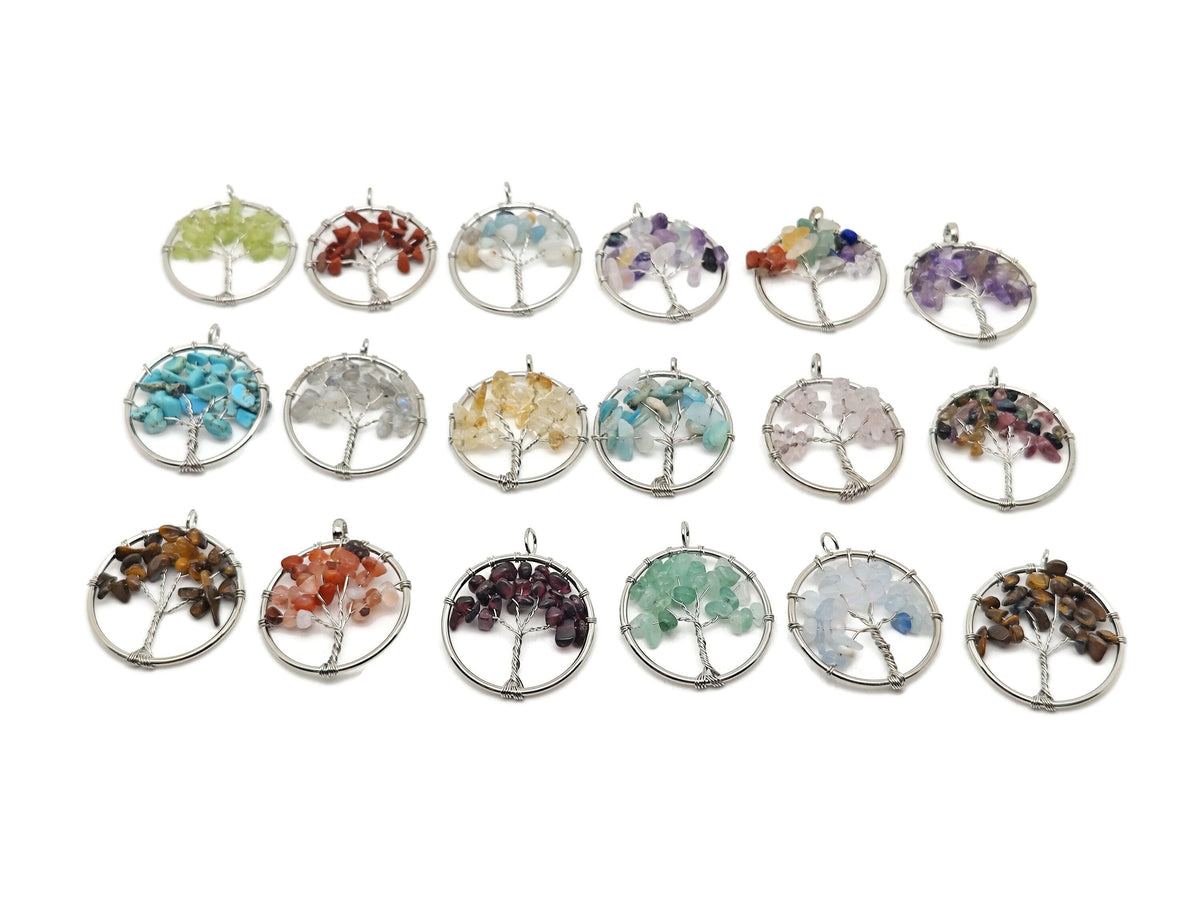 Handmade Tree of Life gemstone pendant from GemstoneGO, featuring colorful crystals and intricate wire details for healing jewelry.