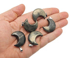Moon crystal pendant from GemstoneGO, 30mm, wholesale jewelry supply featuring a polished, crescent-shaped gemstone for jewelry making.