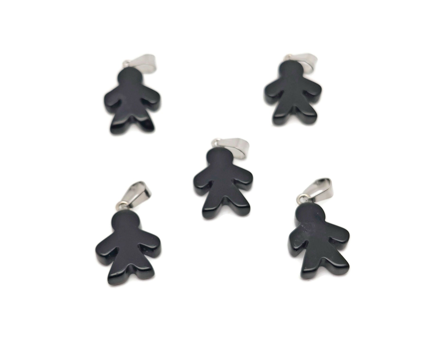 Obsidian gingerbread cookies men crystal pendant from GemstoneGO featuring detailed mineral specimen design.