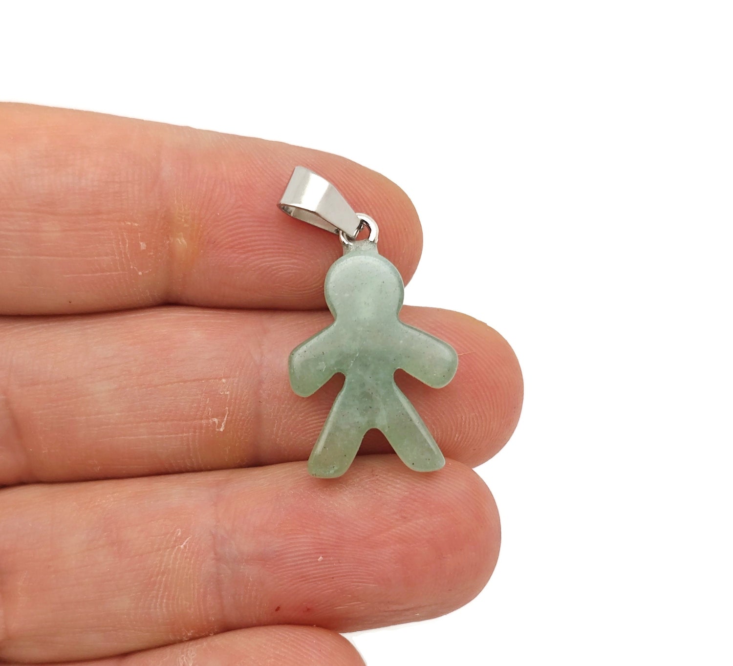 Aventurine gingerbread cookie-shaped crystal pendant from GemstoneGO featuring a detailed mineral specimen design.