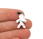 Howlite gingerbread man crystal pendant from GemstoneGO, featuring detailed gingerbread cookie design in mineral specimen style.