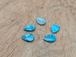 Blue apatite dainty drop crystal pendant for DIY jewelry making, featuring a delicate blue gemstone and silver-tone setting.