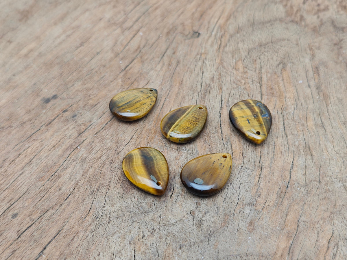 Dainty Tiger Eye crystal drop pendant for DIY jewelry making, featuring a polished teardrop shape from GemstoneGO.
