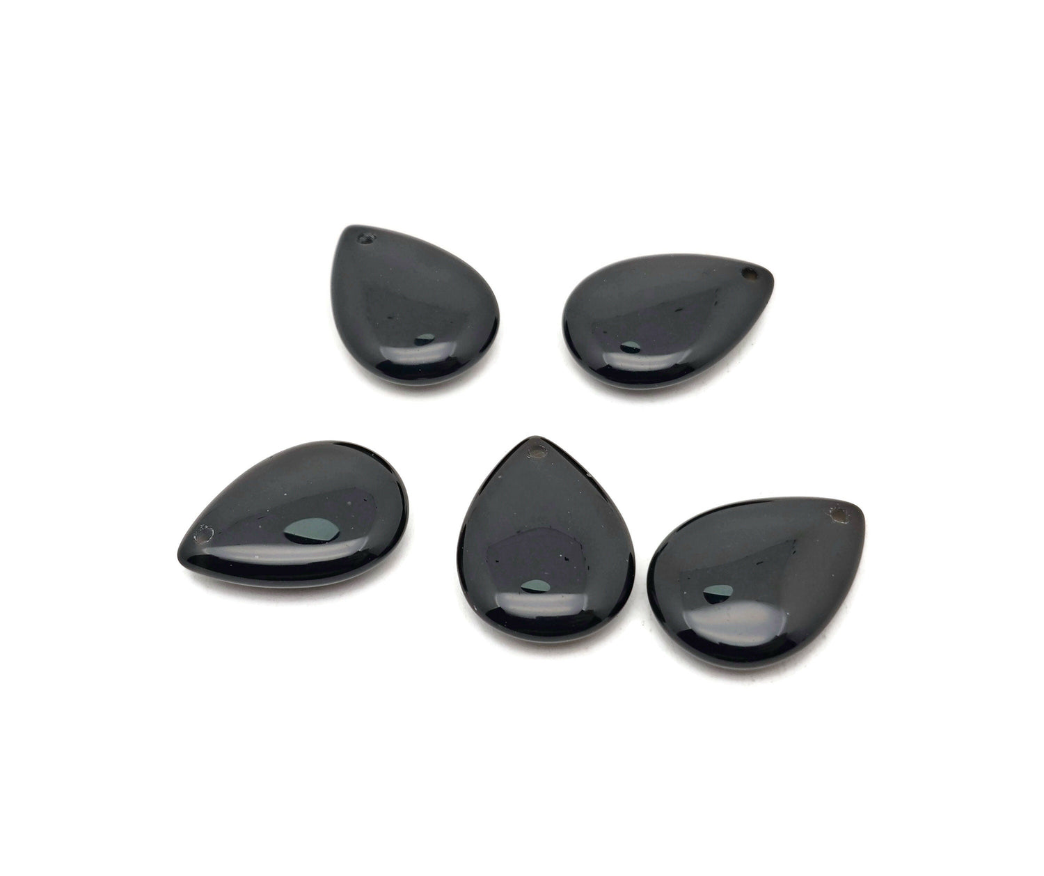 Dainty obsidian drop crystal pendant from GemstoneGO for DIY jewelry making, featuring a smooth black stone with a metal loop for necklaces.