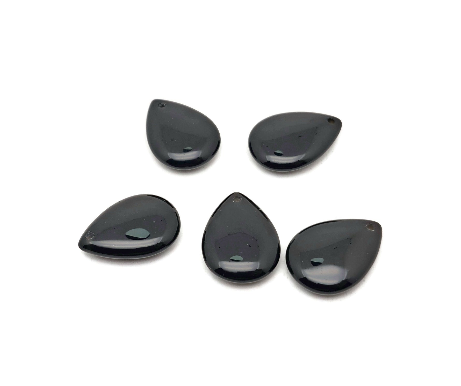 Dainty obsidian drop crystal pendant from GemstoneGO for DIY jewelry making, featuring a smooth black stone with a metal loop for necklaces.