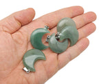Aventurine moon gemstone pendant featuring a crescent moon design by GemstoneGO, showcasing green aventurine with a smooth finish.