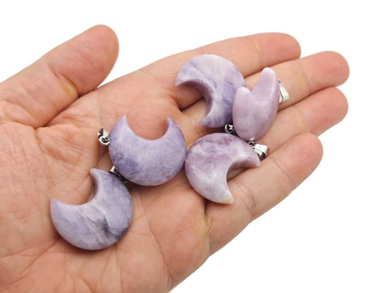 Lepidolite moon gemstone pendant featuring a crescent moon shape, crafted by GemstoneGO, with a polished purple stone and silver bail.