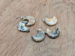 Crazy Lace Agate moon gemstone pendant with crescent moon shape, handcrafted by GemstoneGO.