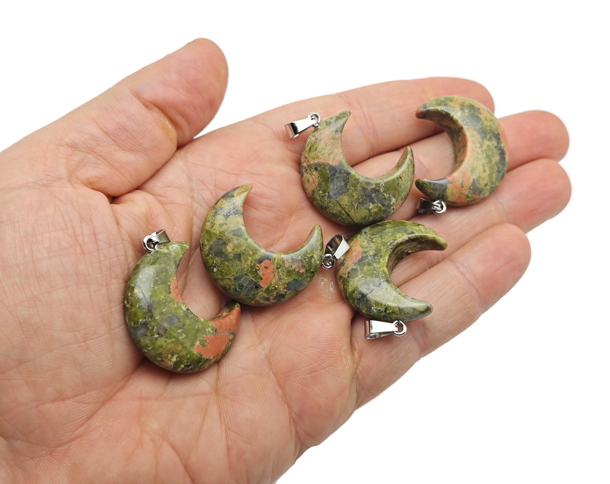 Unakite moon gemstone pendant with crescent moon shape, featuring vibrant green and pink hues, by GemstoneGO.