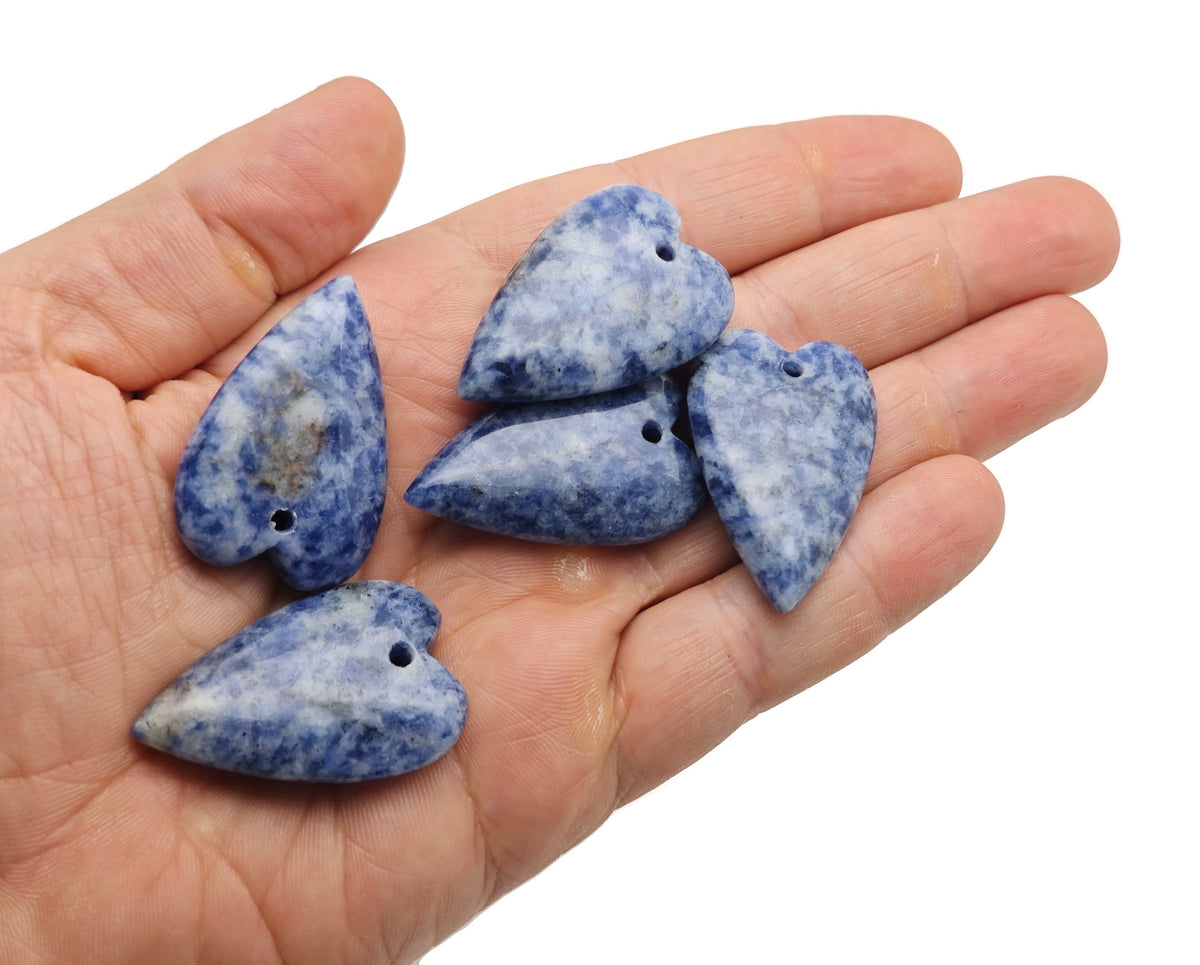 Blue Spot Jasper heart-shaped pendant featuring a healing gemstone with a polished, vibrant blue and spotty pattern.