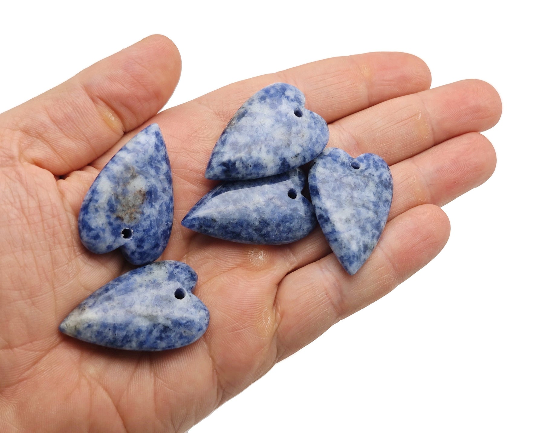 Blue Spot Jasper heart-shaped pendant featuring a healing gemstone with a polished, vibrant blue and spotty pattern.