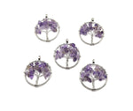 Amethyst Tree of Life gemstone pendant featuring purple amethyst crystals on a silver setting, displayed close-up.
