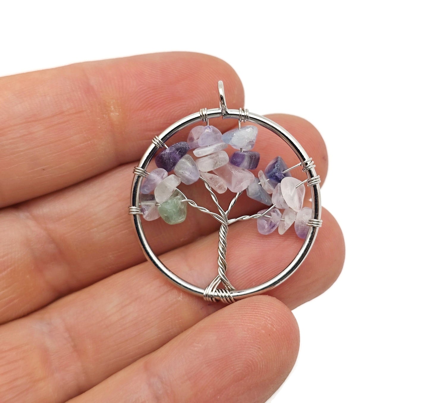 Fluorite Tree of Life gemstone pendant featuring colorful crystals and intricate wire design, handcrafted by GemstoneGO.