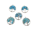 Turquoise Tree of Life gemstone pendant by GemstoneGO featuring a detailed crystal design on silver-tone setting.