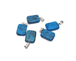 Blue Apatite rectangle-shaped crystal pendant from GemstoneGO, showcasing a polished, vibrant blue gemstone on a silver setting.