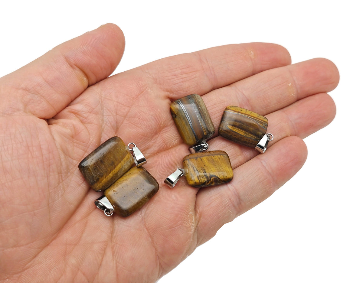 Tiger Eye rectangle-shaped crystal pendant from GemstoneGO, showcasing a polished gemstone with rich golden-brown hues.