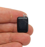 Obsidian rectangle-shaped crystal pendant from GemstoneGO, showcasing a sleek black gemstone with a polished finish.