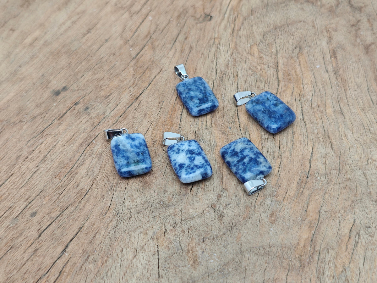 Sodalite rectangle-shaped crystal pendant from GemstoneGO, showcasing deep blue and white natural gemstone details.