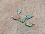 Unakite rectangle-shaped crystal pendant from GemstoneGO, showcasing vibrant green and pink hues for jewelry making.