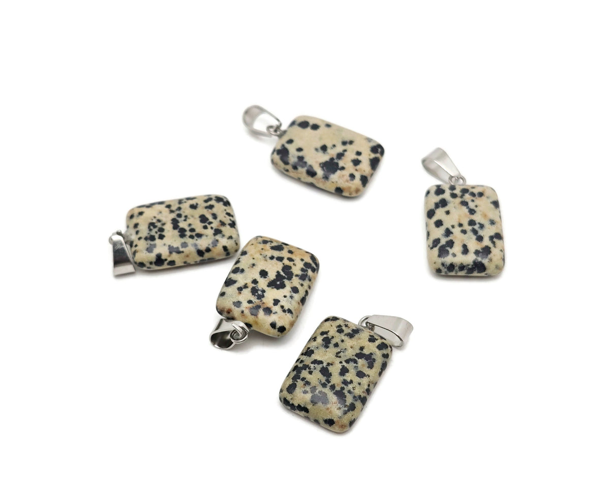 Dalmatian Jasper rectangle crystal pendant from GemstoneGO, showcasing black and cream spotted gemstone with polished finish.