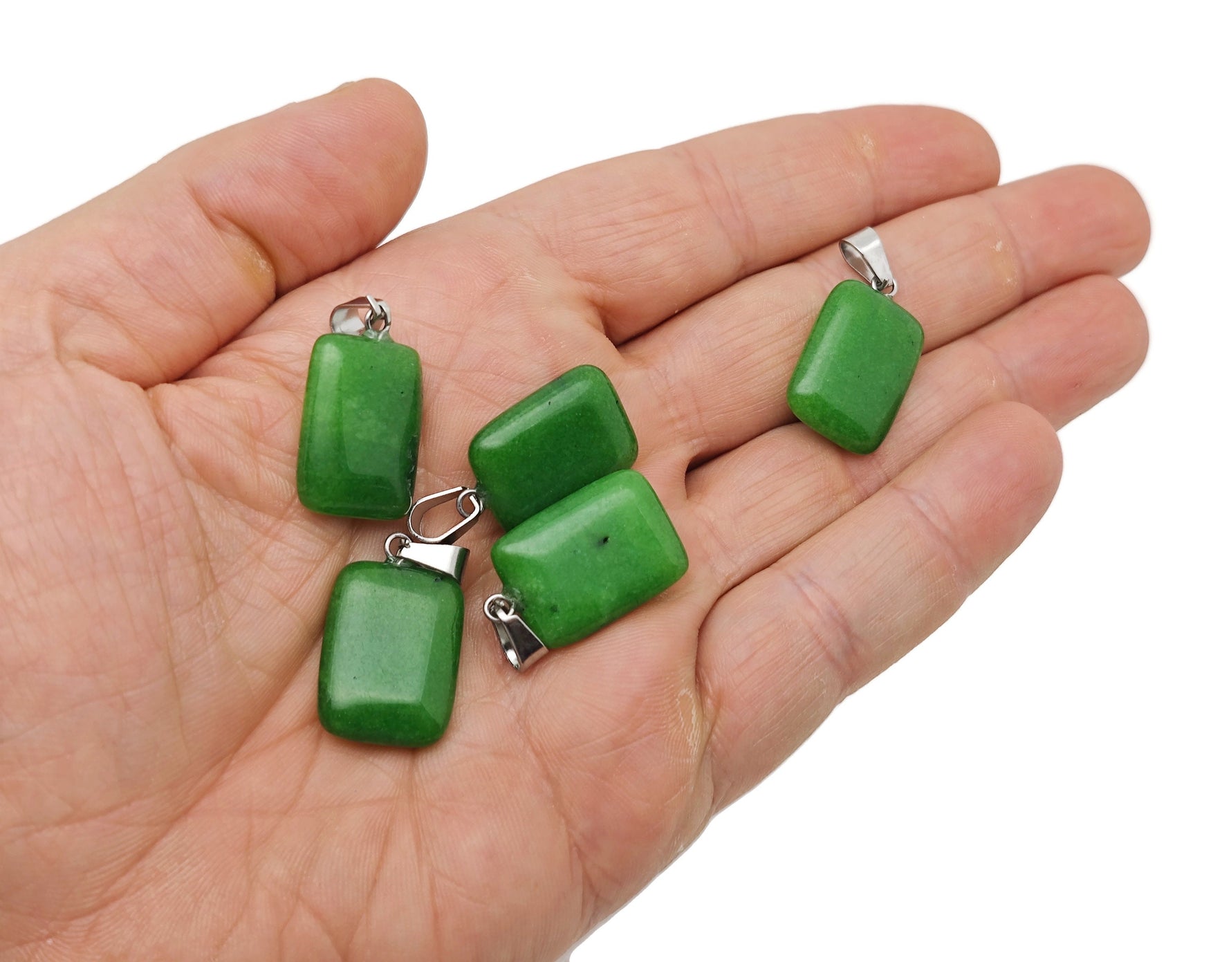 Green agate rectangle pendant from GemstoneGO, showcasing a polished gemstone with natural green banding and smooth rectangular shape.