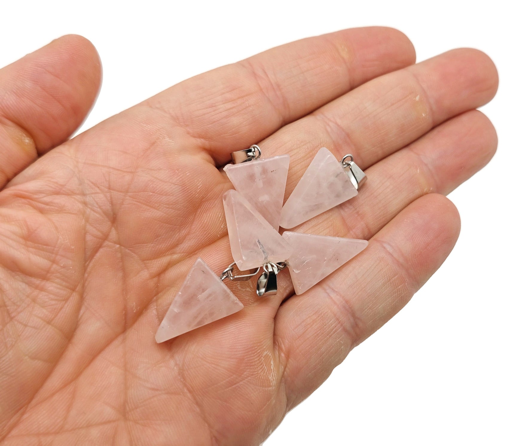 Rose quartz triangle crystal pendant from GemstoneGO, showcasing a polished pink gemstone pendant with a silver bail.