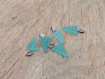 Aventurine triangle-shaped crystal pendant from GemstoneGO, showcasing a green gemstone with natural facets and a silver bail.