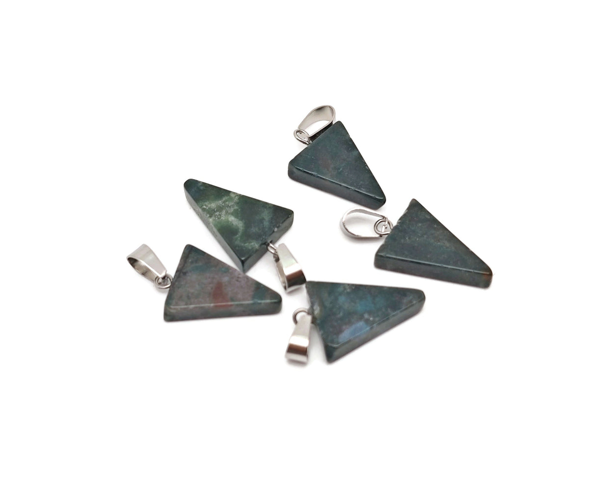 Moss agate triangle-shaped crystal pendant from GemstoneGO, showcasing natural green and brown patterns on a smooth polished surface.