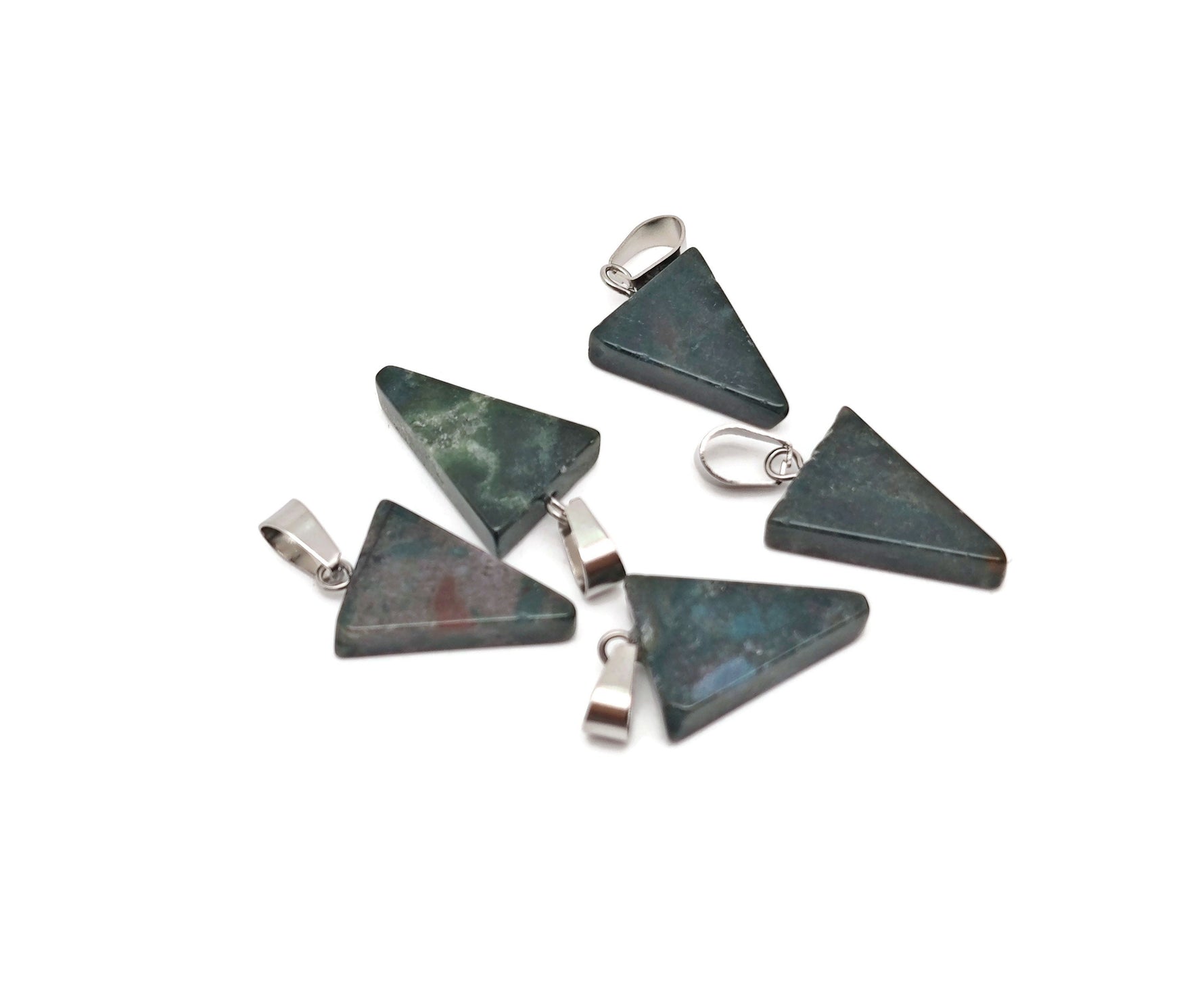 Moss agate triangle-shaped crystal pendant from GemstoneGO, showcasing natural green and brown patterns on a smooth polished surface.